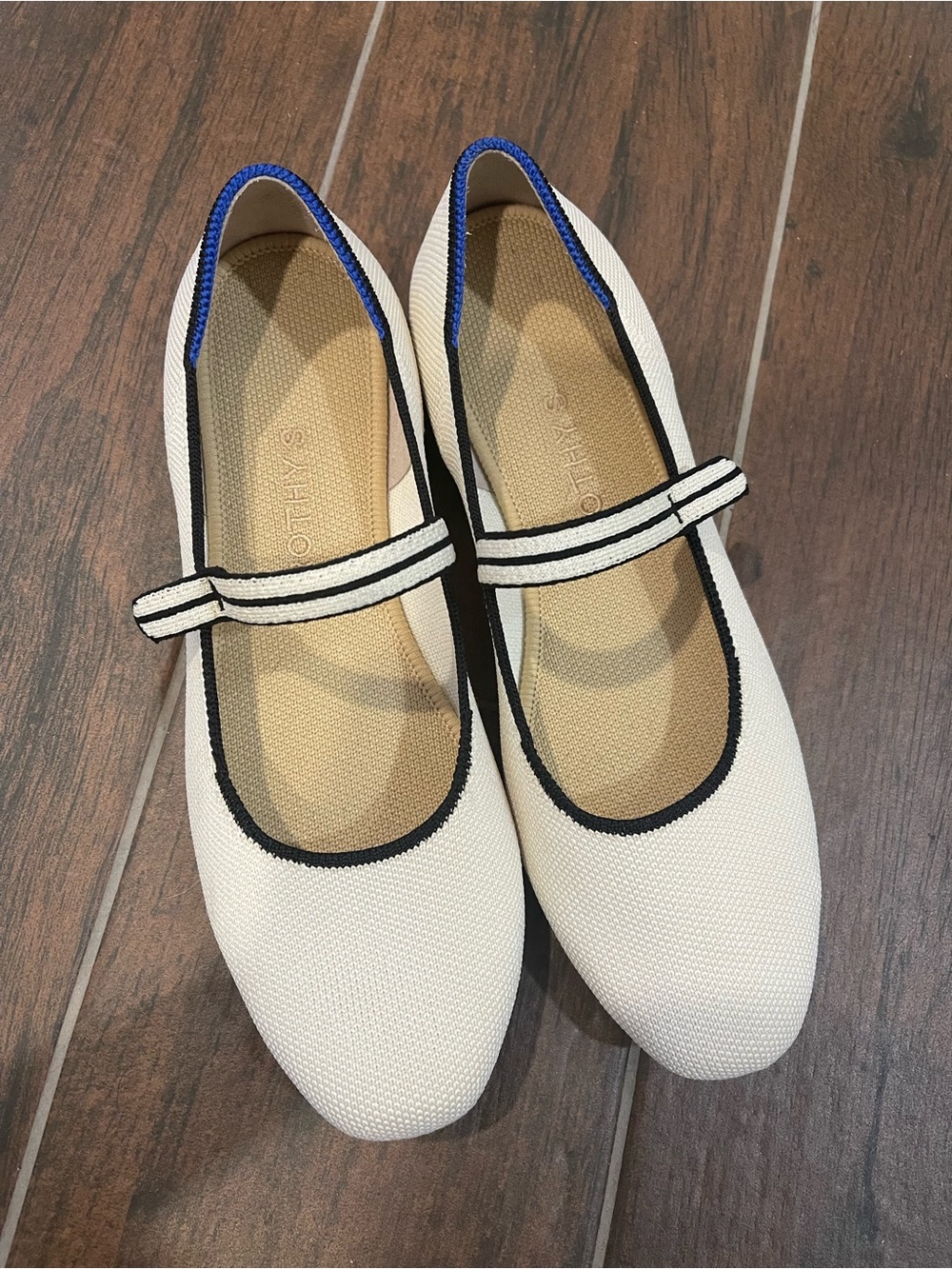 Rothy's White Mary Jane Flats with Black Trim and Blue Heel Lining